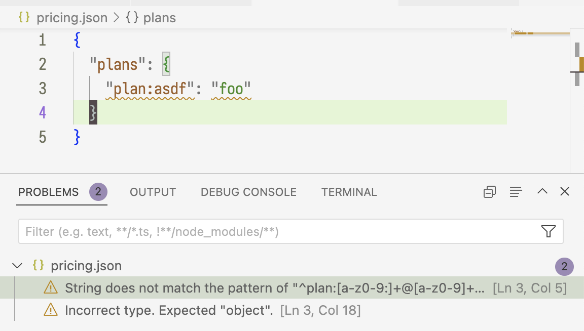 screenshot of VSCode showing a warning about invalid pricing.json